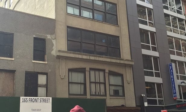 Lu Zhiqiang's company may replace this modest building at 163 Front St. in Manhattan with one of the tallest towers in that area. (Photo: Allison Bell/LHP)