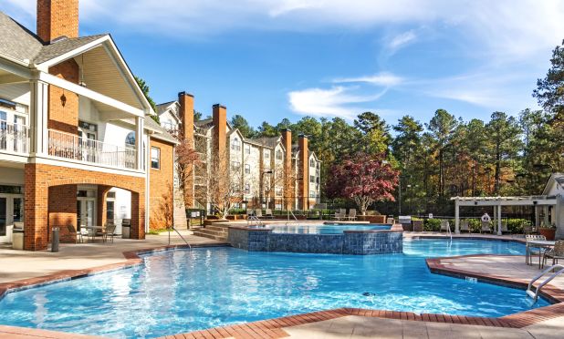 Sugar Mill Apartments, a gated 244-unit garden-style multifamily community in the Northeast Atlanta submarket of Lawrenceville