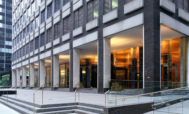 Street-level facade of office tower