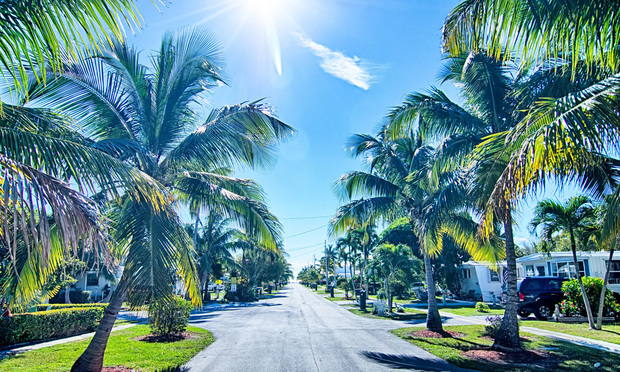 way to the beach with palm trees in key west florida