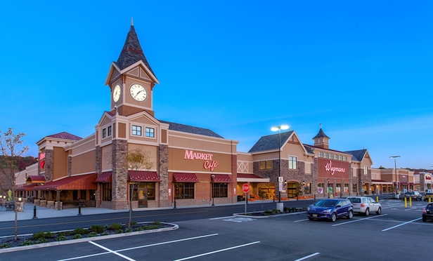 The shops at University Station is anchored by Wegmans.