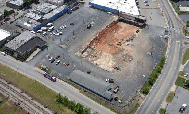 Crews are demolishing the existing 80,000-square-foot city-owned building. 