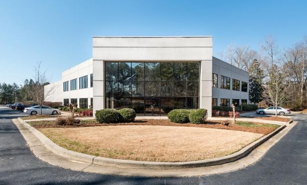 Stan Johnson Company brokered the sale of a freestanding 45,512 square-foot building to RL TCL.
