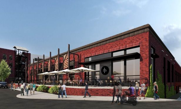 Stockyards, an adaptive reuse renovation of three historic warehouses, is under construction in Atlanta's West Midtown.