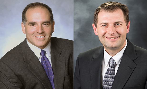Jones Lang LaSalle's Jonathan Meisel, managing director, left, and Stephen Jenco, vice president, suburban research 