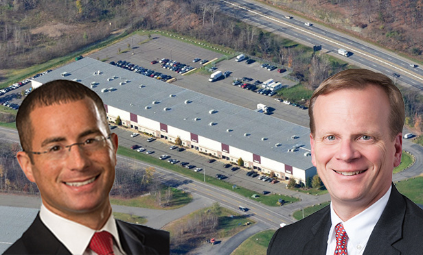 Adam Schindler, left, and John Susanin of Colliers International arranged the lease for Ubiquity's new call center at 1061 Hanover Street, Wilkes-Barre, PA