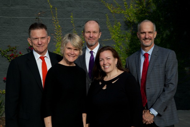 John Arnold, Lise Bornstein and Jonathan Watts pose with the company founders Wade Killefer and Barbara Flammang.
