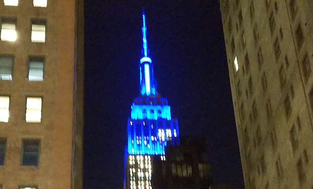 Empire State Building goes blue.